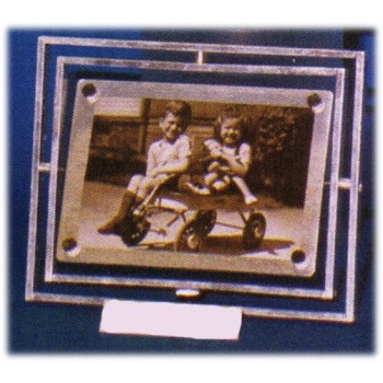 Portafoto cromato girevole 2 foto cm. 10x7,5